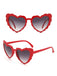 Occhiali da sole vintage con montatura a cuore curvo