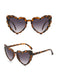 Occhiali da sole vintage con montatura a cuore curvo