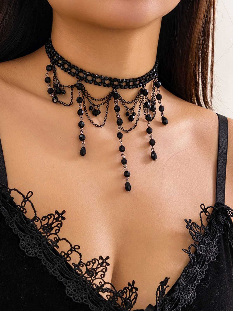 Collana gotico con nappe in cristallo artificiale nero