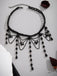 Collana gotico con nappe in cristallo artificiale nero