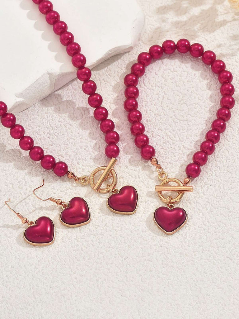 Set di collana e bracciale e orecchini con perle a cuore