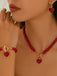 Set di collana e bracciale e orecchini con perle a cuore