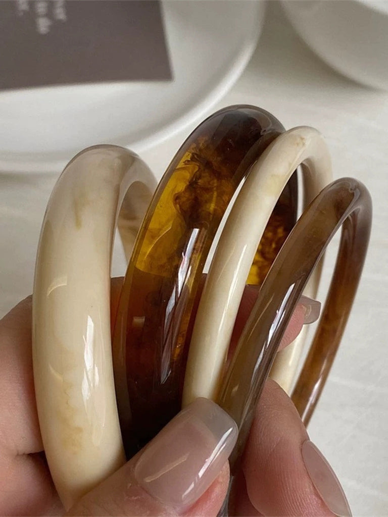 4PCS Set di Bracciali Rigidi Impilabili in Resina Marmorizzata Ambra e Avorio 2