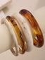4PCS Set di Bracciali Rigidi Impilabili in Resina Marmorizzata Ambra e Avorio