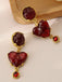 Orecchini in resina a forma di cuore bordeaux