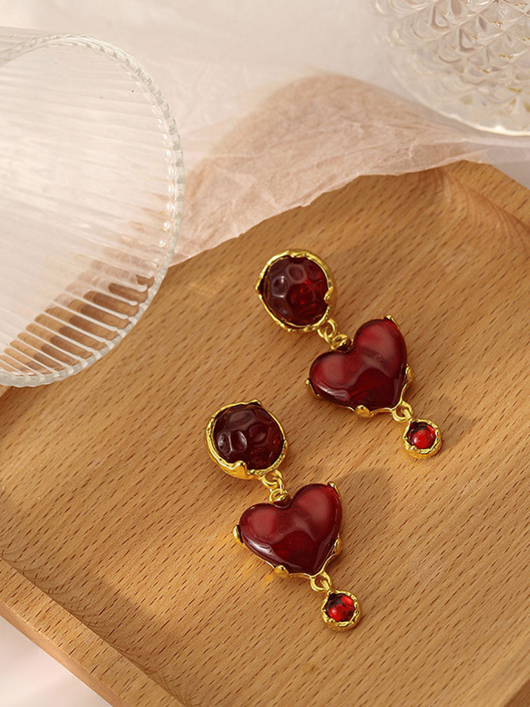 Orecchini in resina a forma di cuore bordeaux