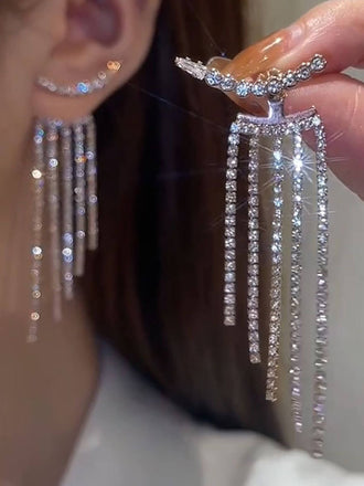 Orecchini vintage con nappe in argento e strass