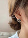Orecchino floreale vintage con diamanti