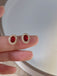 Orecchini vintage con diamanti e cristallo ovale rosso