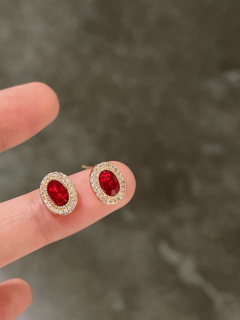 Orecchini vintage con diamanti e cristallo ovale rosso