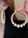 Orecchini vintage a cerchio grande con perle