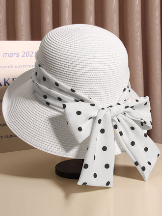Cappello di paglia bianco con fiocco a pois