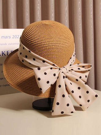 Cappello di paglia marrone chiaro con fiocco a pois