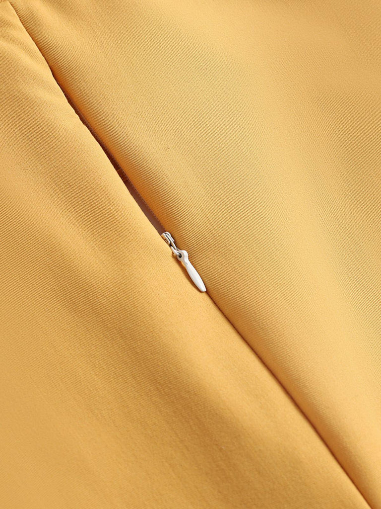 Abito a ruota bottoni giallo anni '50
