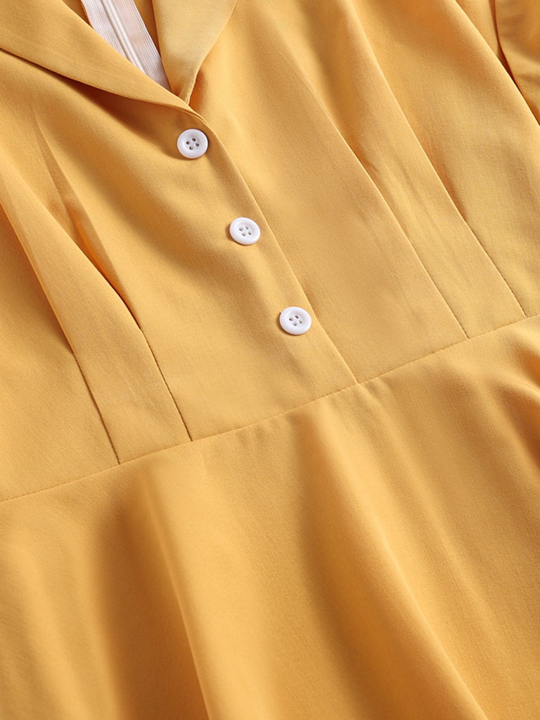 Abito a ruota bottoni giallo anni '50