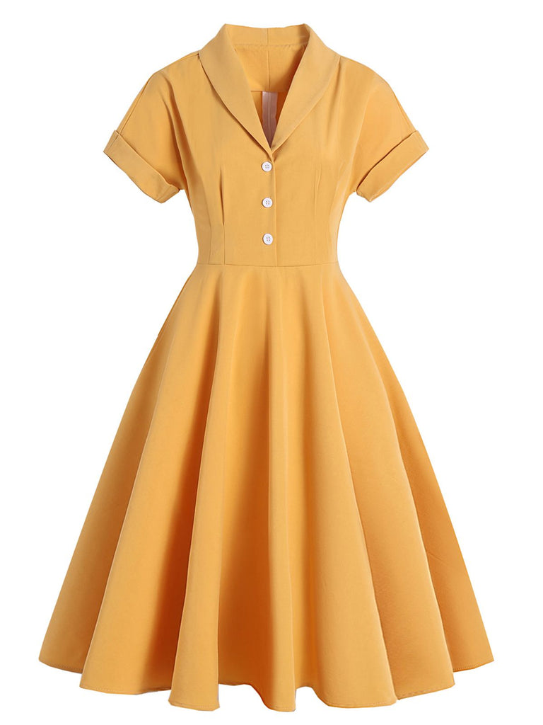 Abito a ruota bottoni giallo anni '50