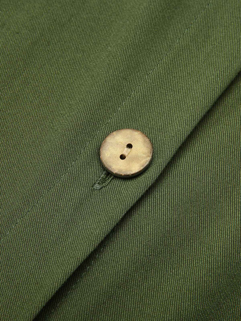 Abito con spacchi e cintura tinta unita verde anni '40