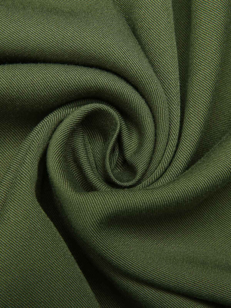 Abito con spacchi e cintura tinta unita verde anni '40