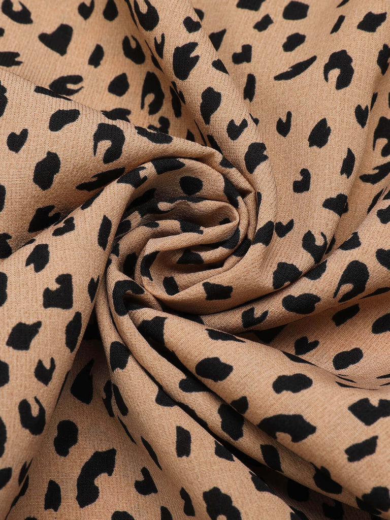 Tuta corta scollo a V maniche a sbuffo stampa leopardo anni '30