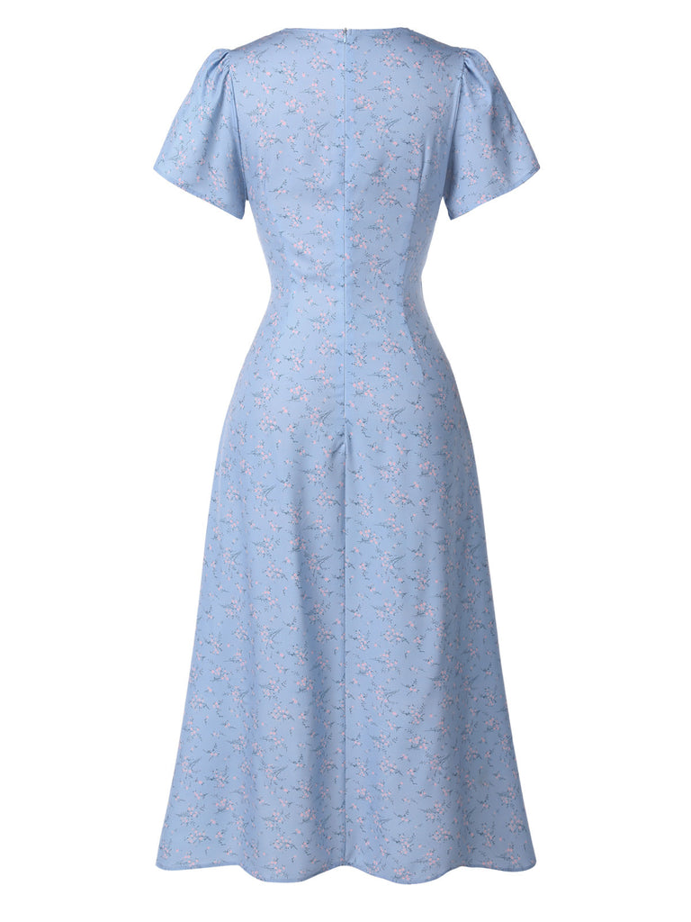 Abito floreale con scollo a V bottoni blu anni '40