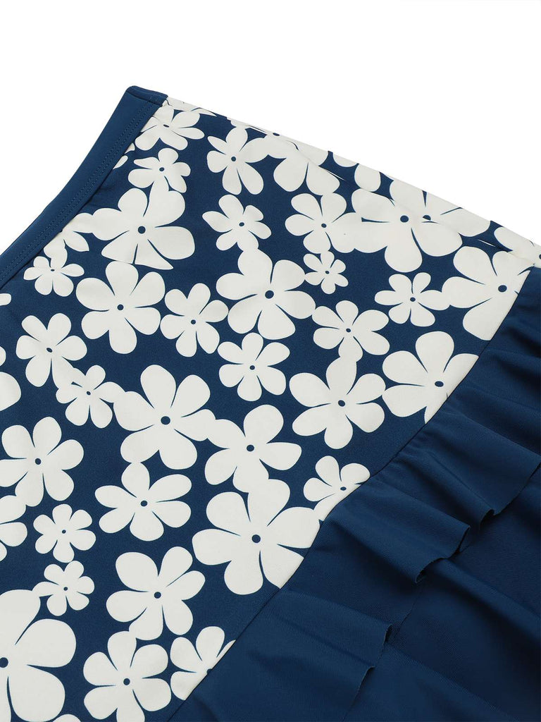 Costumi con floreale volant scollo all'americana blu anni '40