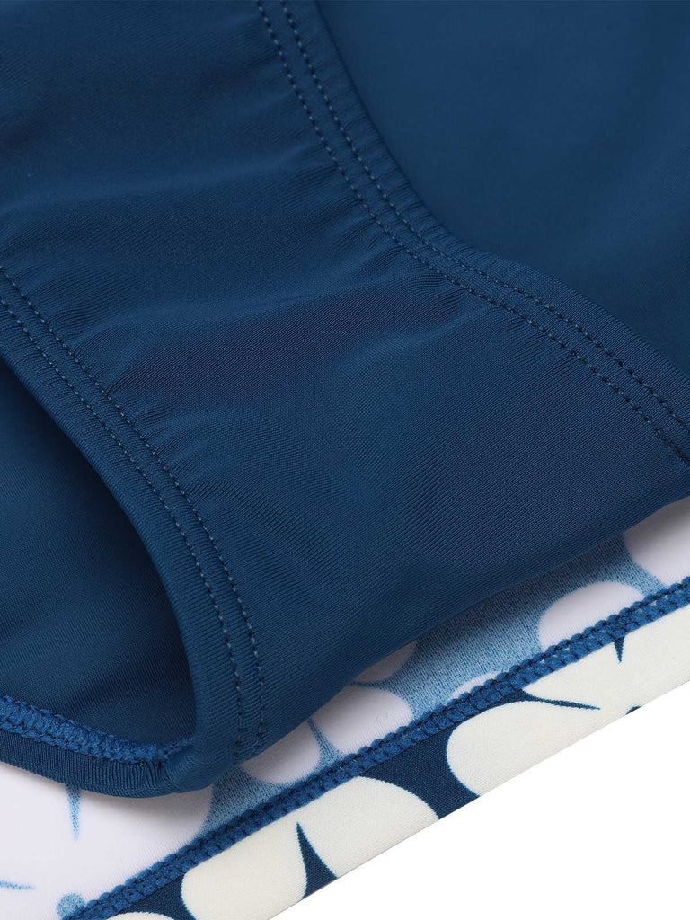 Costumi con floreale volant scollo all'americana blu anni '40