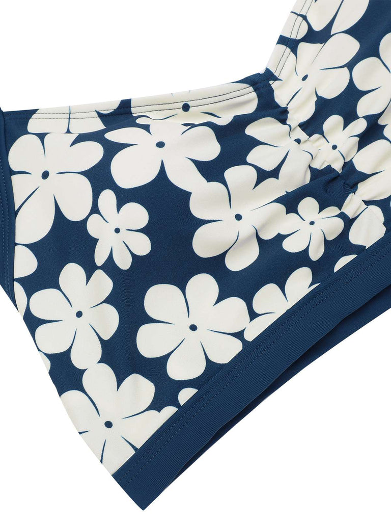 Costumi con floreale volant scollo all'americana blu anni '40