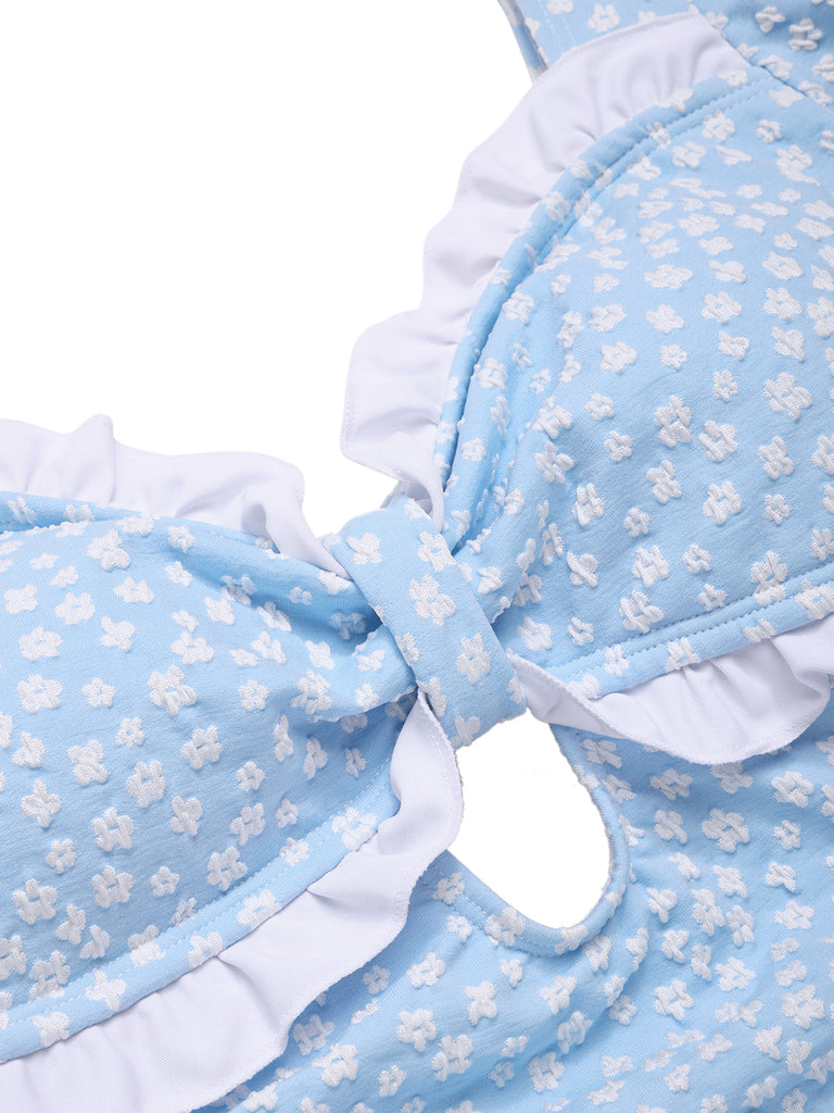 Costumi intero floreale con volant blu anni '40