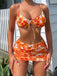 Bikini con gonna silhouette floreale arancione anni '50
