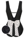 Costumi intero a pois fiocco e scollo a V nero anni '50