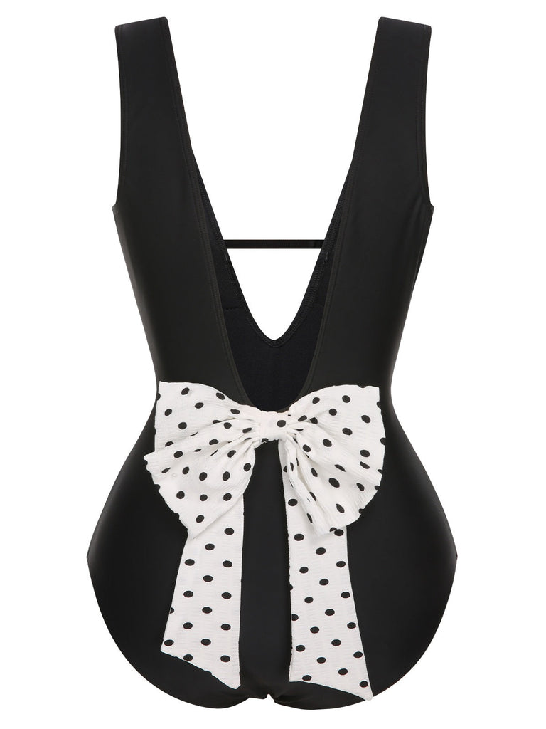 Costumi intero a pois fiocco e scollo a V nero anni '50