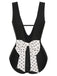 Costumi intero a pois fiocco e scollo a V nero anni '50