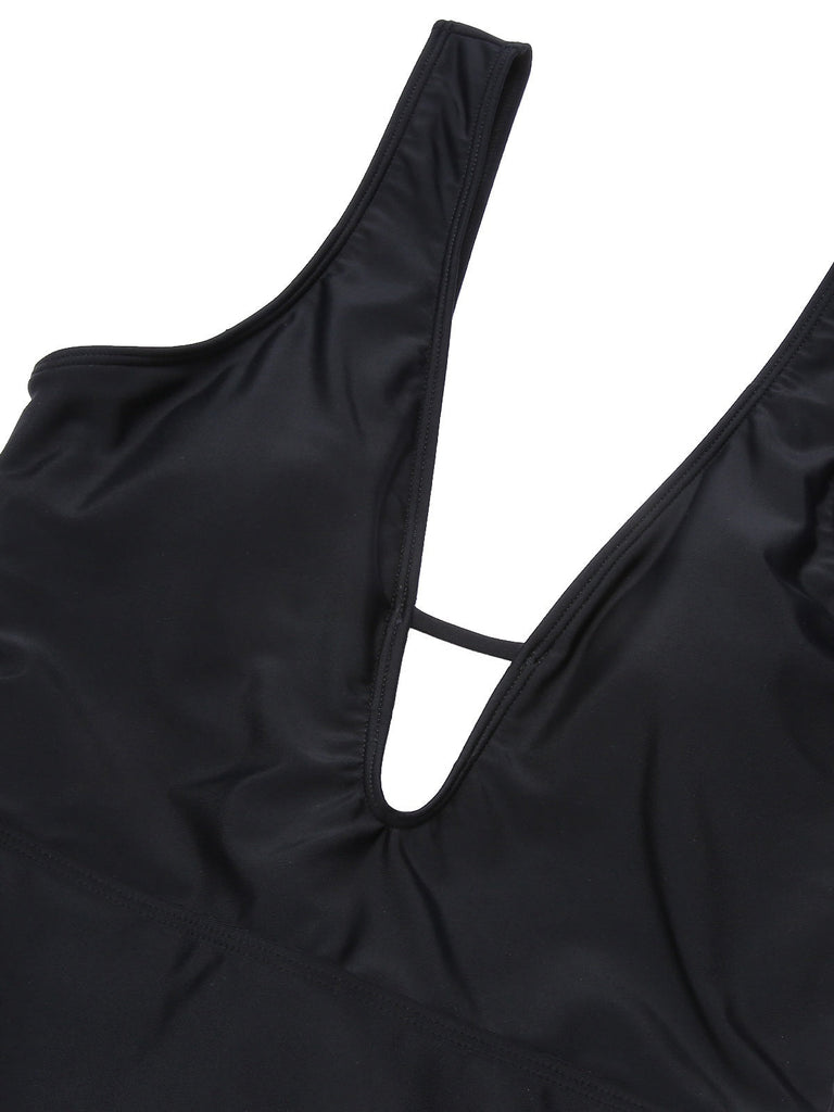 Costumi intero a pois fiocco e scollo a V nero anni '50