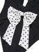 Costumi intero a pois fiocco e scollo a V nero anni '50