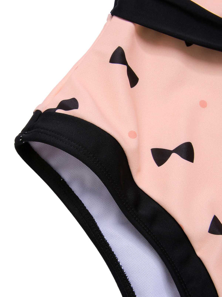 Costumi intero stampa a pois e fiocco rosa anni '50