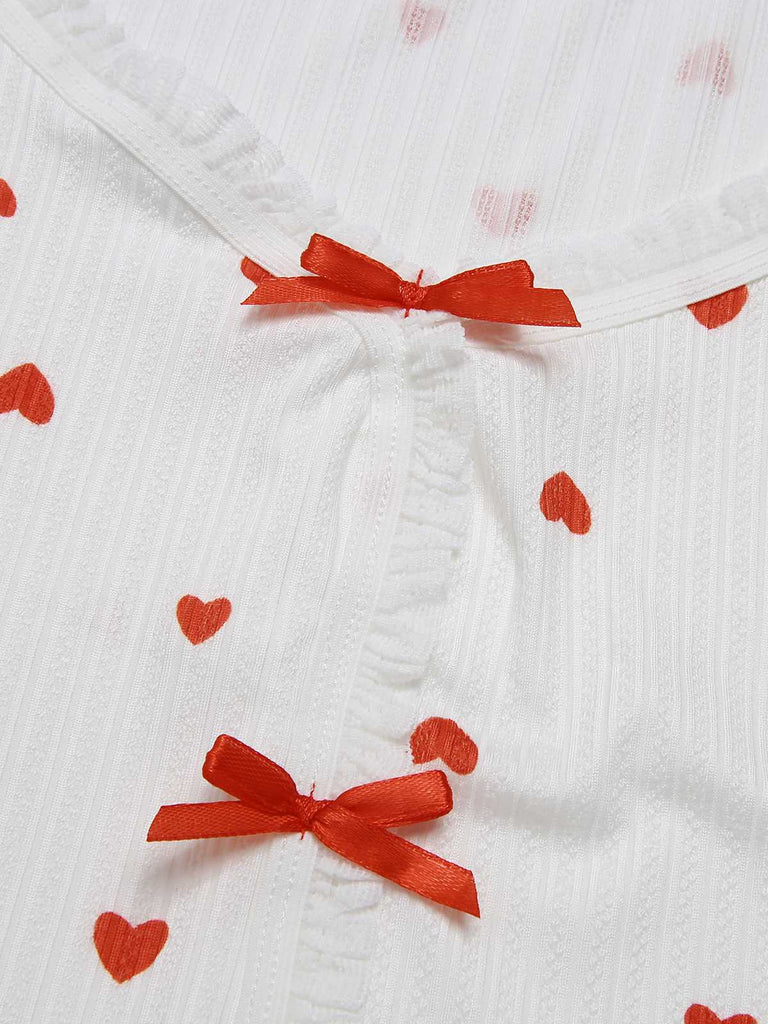 Pigiama a maniche lunghe con fiocco a cuore bianco anni '70