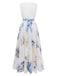 Floral dress with a white top and blue floral skirt on a white background