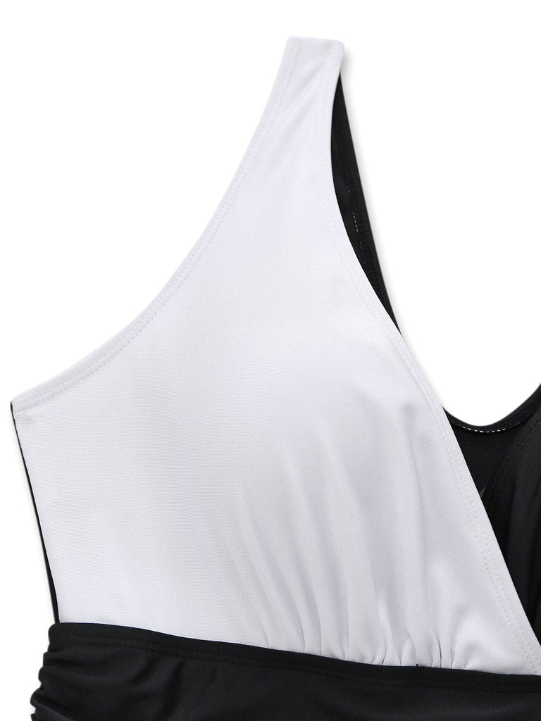 White ruffle one-piece swimsuit fabric detail close-up showing premium material texture and quality