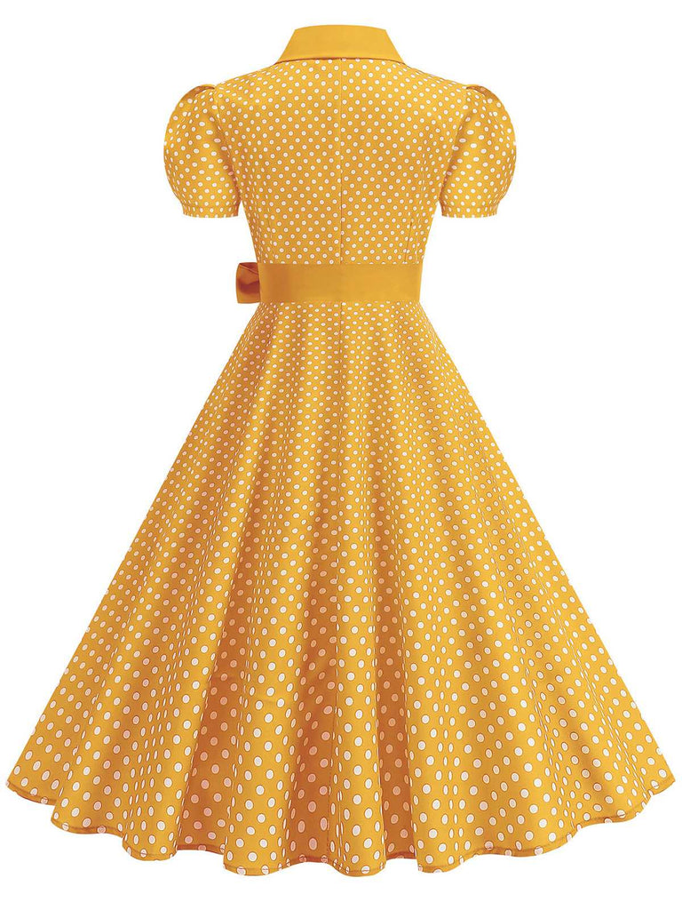 Vintage polka dot belted swing dress with shirt collar in classic 1950s retro style