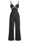Tuta lunga in pizzo a pois con spalline nero anni '40