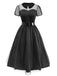 Abito in tulle trasparente e colletto Peter Pan nero anni '40