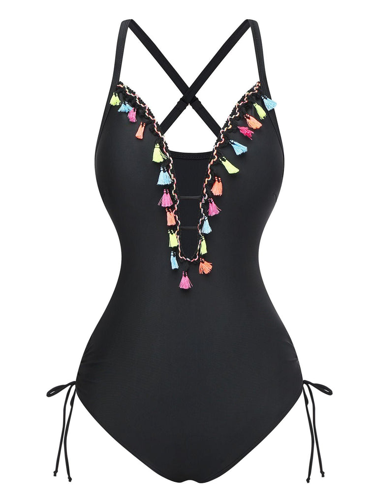 A black one-piece swimsuit featuring a deep V-neckline decorated with colorful hanging tassels and side-tie details.