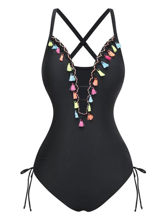 A black one-piece swimsuit featuring a deep V-neckline decorated with colorful hanging tassels and side-tie details.