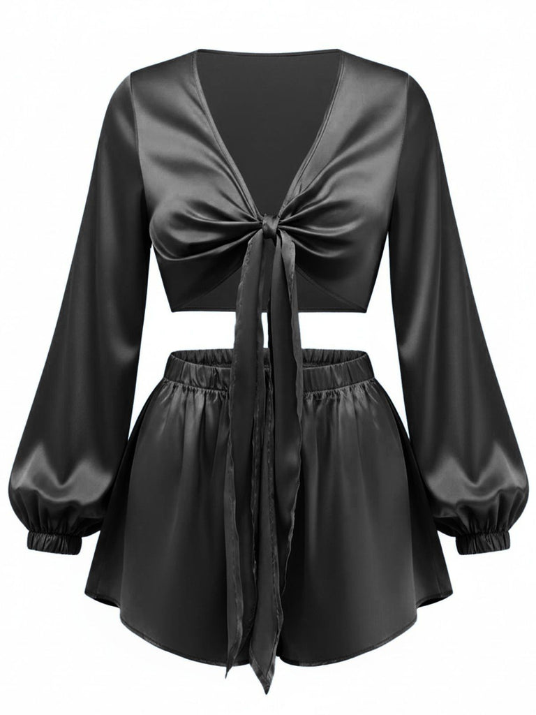 The tie-front silky satin two-piece set shown in classic black for a sophisticated lounge look.