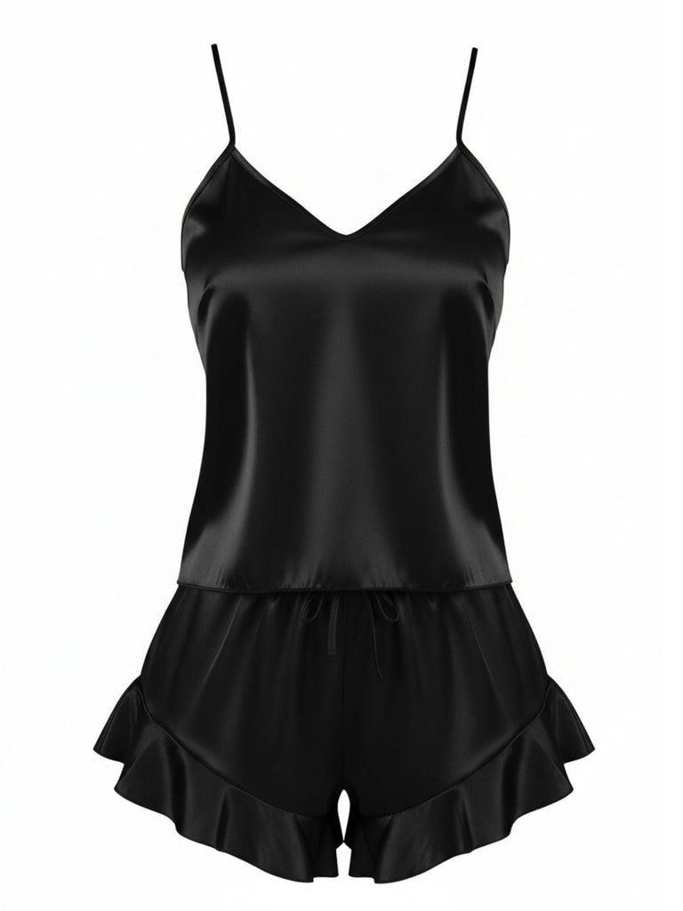 The two-piece silky satin cami and shorts set shown in classic black with feminine ruffle details.