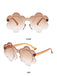 Classic brown gradient flower-shaped shades with transparent amber frames viewed from the front and side.