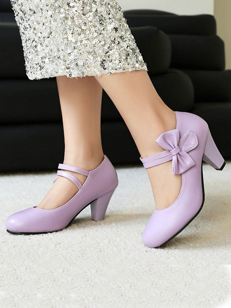 Scarpe con tacco alto in pelle con cinturino a fiocco