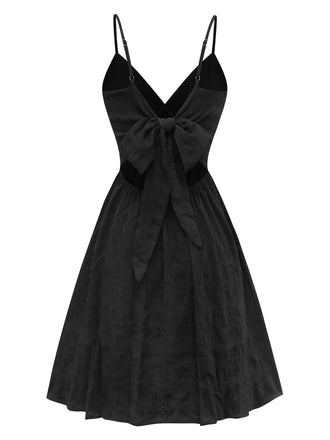 Abito boho ricamato a fiori con fiocco posteriore nero anni '70