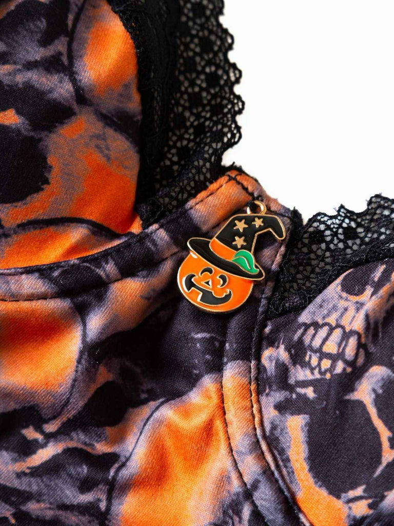 Collant in pizzo e teschio con spalline sottili arancione anni '70