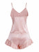 Rear view of the dusty pink satin pajama set, highlighting the clean finish and elastic waistband on the shorts.
